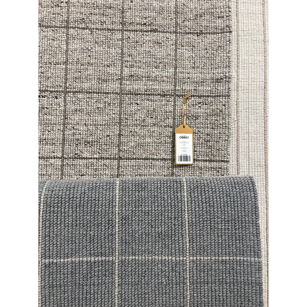 Featuring Oxford Club Rug by Jaipur Living at Amethyst Home. Elegant and casual in the same moment, the Oxford Club by Barclay Butera introduces handwoven accents to an array of spaces. The natural, undyed yarns complement a range of palettes and styles, perfectly paired for modern and traditional homes alike. The Club design features a grid pattern in an.  Amethyst Home provides interior design, new home construction design consulting, vintage area rugs, and lighting in the Des Moines metro area.