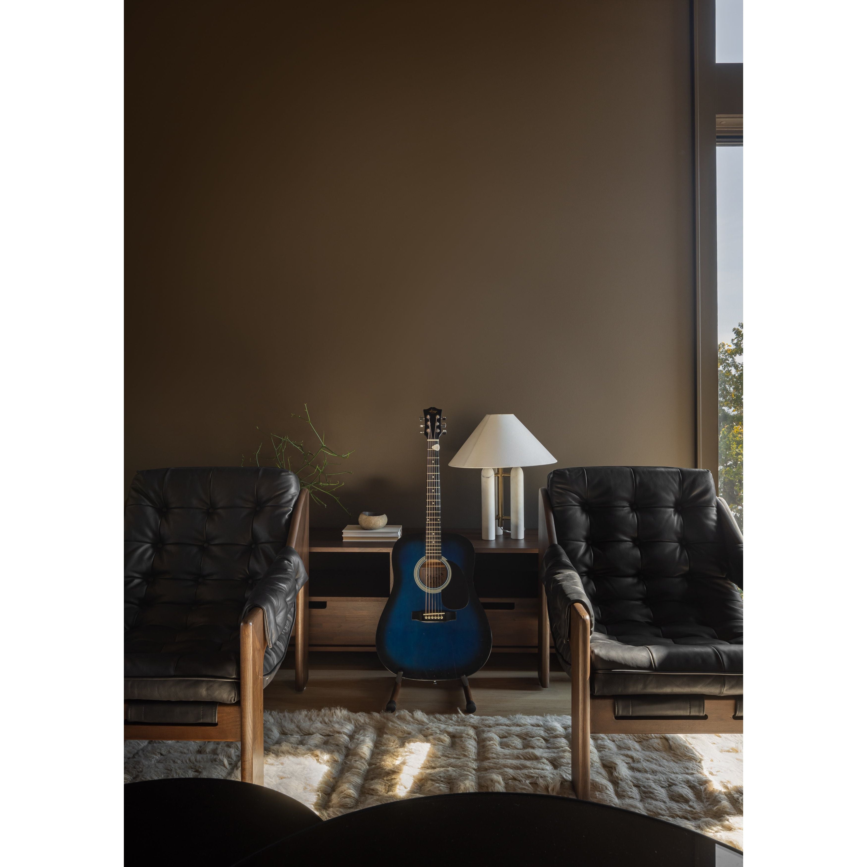 Featuring Halston Black Leather Chair by Four Hands at Amethyst Home. Featured in one of our recent home tours -- the Halston leather chair is the ultimate in comfort and surprised everyone who sat in it.  It has a hammock sling style construction that just feels sooo right.
Overall Dimensions: 30"W x 34.25"L x 32"HMaterials: Top Grain Leather, Solid AshSea. Amethyst Home provides interior design, new home construction design consulting, vintage area rugs, and lighting in the Park City metro area.