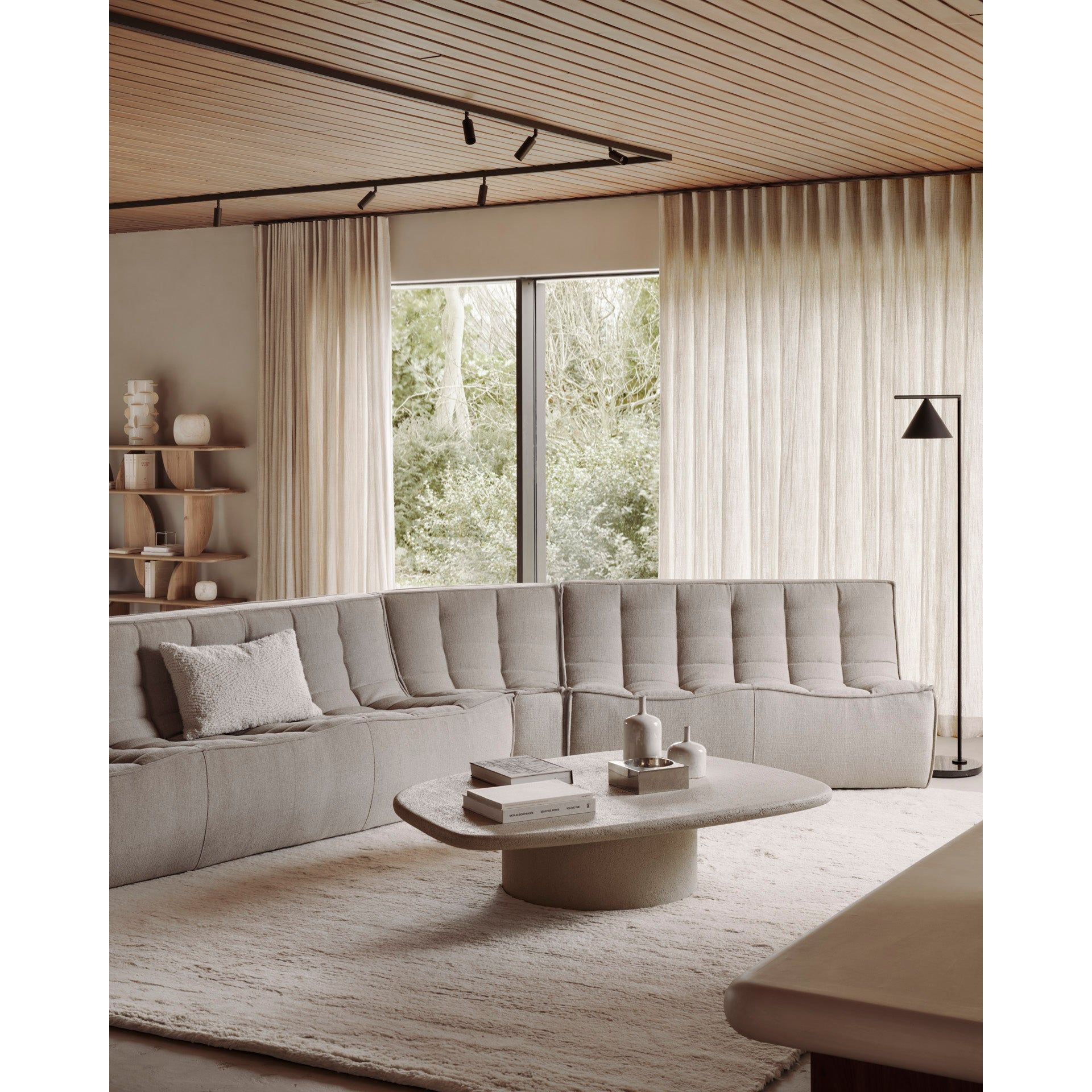 Featuring N701 Ecru 45° Round Corner Modular Sofa Piece by Ethnicraft at Amethyst Home. The N701 sofa is an inviting design that oozes comfort and relaxation. By combining the different modules and sizes, you have unlimited possibilities when it comes to creating your own unique setting.Weight : 30 lbs Dimensions: 39" W x 33" L x 30" H.  Amethyst Home provides interior design, new home construction design consulting, vintage area rugs, and lighting in the Houston metro area.