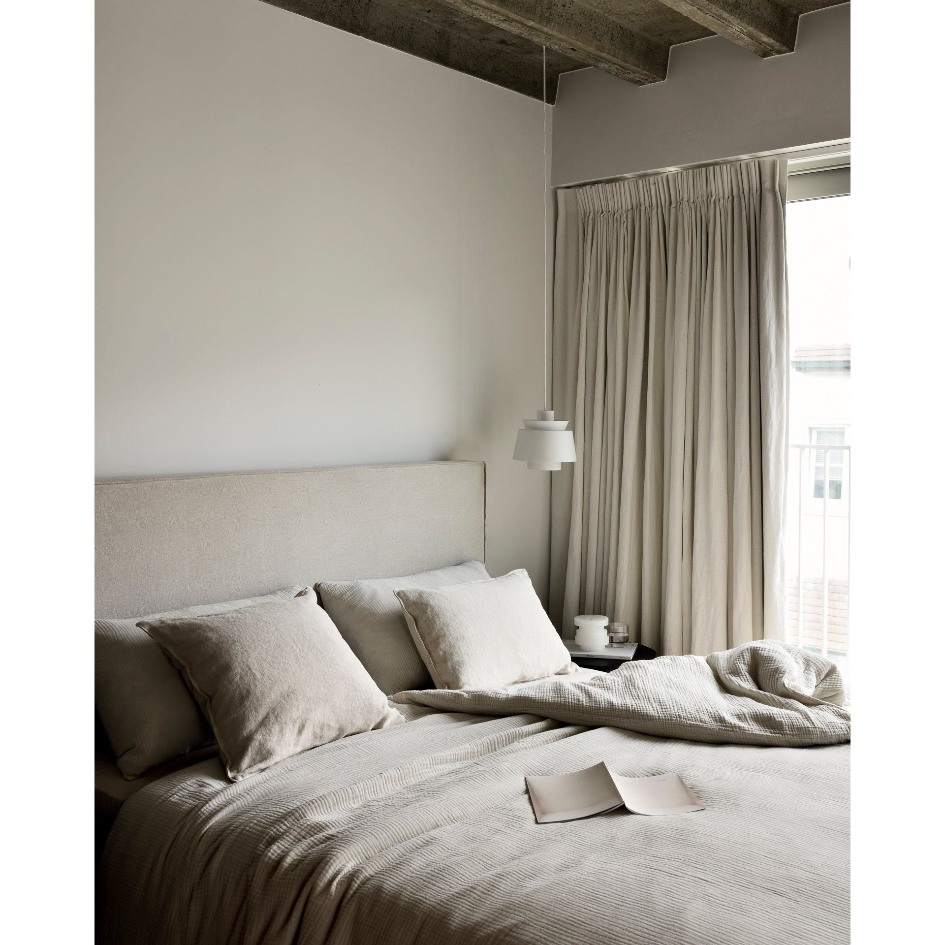 Featuring Revive Removable Linen Sand Bed by Ethnicraft at Amethyst Home. Find solace in the Revive bed, where comfort meets practicality. Its linen headboard, effortlessly removable for dry cleaning, ensures a fresh and inviting space. Stitched details add a touch of refined elegance and create a soft backdrop that whispers tranquility into the bedroo.  Amethyst Home provides interior design, new home construction design consulting, vintage area rugs, and lighting in the Winter Garden metro area.