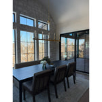 Featuring Wilmington Alcala Fawn Dining Chair by Four Hands at Amethyst Home. An Amethyst fave -- the Wilmington dining chair has a gorgeous coffee colored textile paired with medium toned wood and interesting leather buckles on the back -- we tied in the gold buckles with the gold chandelier above!  Inspired by the folded pillow form, the seat and back cu. Amethyst Home provides interior design, new home construction design consulting, vintage area rugs, and lighting in the Scottsdale metro area.