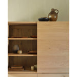 Featuring Ligna Black Oak Cupboard by Ethnicraft at Amethyst Home. A clean and pure look with black metal legs, the Ligna storage cupboard offers a perfect storage facility for the kitchen, living room or dining room.Weight : 293 lbs Dimensions: 20" W x 43.5" L x 64" H.  Amethyst Home provides interior design, new home construction design consulting, vintage area rugs, and lighting in the Washington metro area.