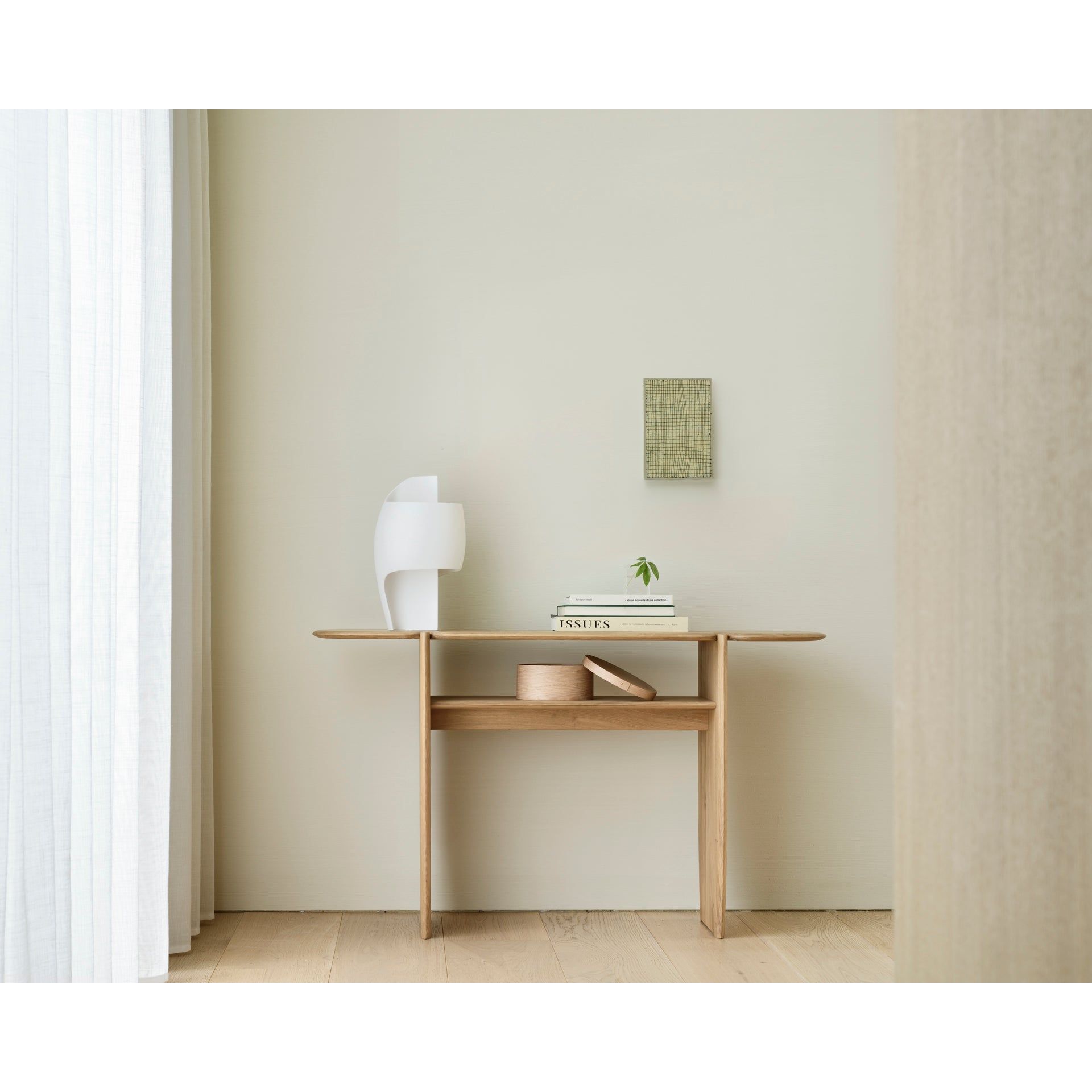 Featuring Pi Oak Console by Ethnicraft at Amethyst Home. The PI collection honours nature’s design by keeping the strength, curves and lines, as nature intended. Interesting shapes are discovered in this sleek and stylish, polished imperfect, finish. Each PI item is finished by hand to ensure that the individual character of the wood is respected. The .  Amethyst Home provides interior design, new home construction design consulting, vintage area rugs, and lighting in the Newport Beach metro area.