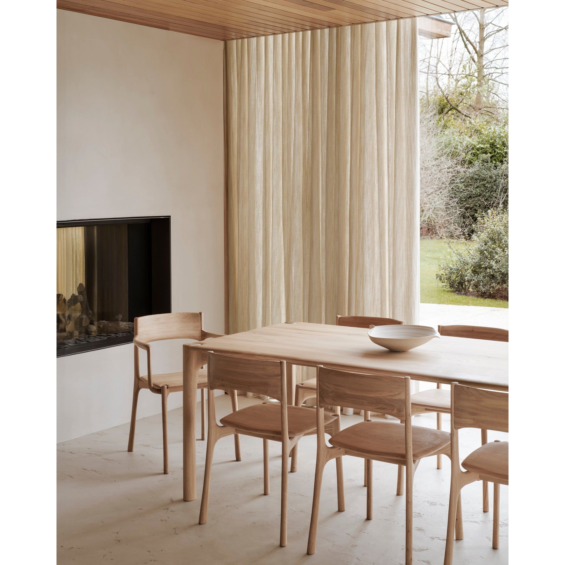 Featuring Pi Armless Oak Dining Chair by Ethnicraft at Amethyst Home. The PI collection honors nature’s design by keeping the strength, curves and lines, as nature intended. Interesting shapes are discovered in this sleek and stylish, polished imperfect, finish. Each PI item is finished by hand to ensure that the individual character of the wood is respect.  Amethyst Home provides interior design, new home construction design consulting, vintage area rugs, and lighting in the Park City metro area.