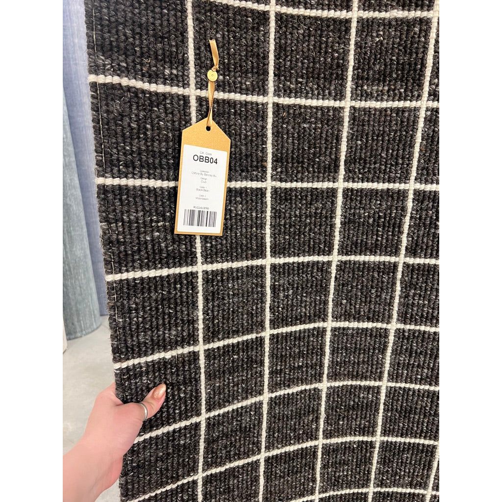 Featuring Oxford Club Rug by Jaipur Living at Amethyst Home. Elegant and casual in the same moment, the Oxford Club by Barclay Butera introduces handwoven accents to an array of spaces. This bolder and darker black colorway complements a range of palettes and styles, perfectly paired for modern and traditional homes alike. The Club design features a grid p.  Amethyst Home provides interior design, new home construction design consulting, vintage area rugs, and lighting in the San Diego metro area.