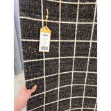 Featuring Oxford Club Rug by Jaipur Living at Amethyst Home. Elegant and casual in the same moment, the Oxford Club by Barclay Butera introduces handwoven accents to an array of spaces. This bolder and darker black colorway complements a range of palettes and styles, perfectly paired for modern and traditional homes alike. The Club design features a grid p.  Amethyst Home provides interior design, new home construction design consulting, vintage area rugs, and lighting in the San Diego metro area.