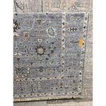 Featuring Rhapsody Nysa Hand-Knotted Rug by Jaipur Living at Amethyst Home. The Rhapsody collection features heirloom-quality designs of stunningly abrashed Old World patterns. The Nysa area rug boasts a beautifully washed floral motif with a decorative border. The blue tone is accented with rich green, tan, navy, and cream hues for added depth and intrigu.  Amethyst Home provides interior design, new home construction design consulting, vintage area rugs, and lighting in the Park City metro area.