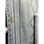 Featuring Cyprus Green Paphos Hand-Knotted Rug by Jaipur Living at Amethyst Home. The hand-knotted Cyprus collection showcases a modern representation of vintage Kars designs with clean-lined geometric details and fresh colorways. The dark and light green Paphos design delights with a minimalistic medallion pattern and a similarly styled border. Low p.  Amethyst Home provides interior design, new home construction design consulting, vintage area rugs, and lighting in the Salt Lake City metro area.