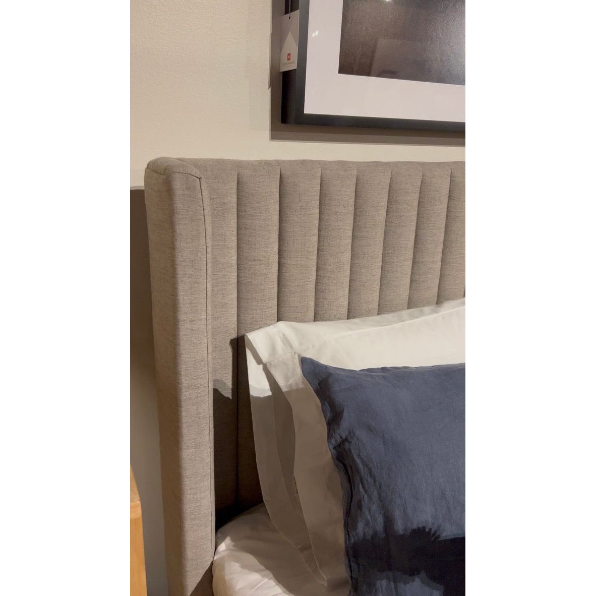 Featuring Montgomery Bed by Four Hands at Amethyst Home. The Montgomery Bed is a tall, vertical-channeled headboard that is upholstered in grey high-performance fabric for a sensible take on modern bedroom styling. A parawood plinth base grounds the whole look. Performance fabrics are specially created to withstand spills, stains, high traffic and wear, ens. Amethyst Home provides interior design, new home construction design consulting, vintage area rugs, and lighting in the Charlotte metro area.