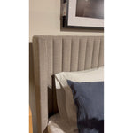 Featuring Montgomery Bed by Four Hands at Amethyst Home. The Montgomery Bed is a tall, vertical-channeled headboard that is upholstered in grey high-performance fabric for a sensible take on modern bedroom styling. A parawood plinth base grounds the whole look. Performance fabrics are specially created to withstand spills, stains, high traffic and wear, ens. Amethyst Home provides interior design, new home construction design consulting, vintage area rugs, and lighting in the Charlotte metro area.