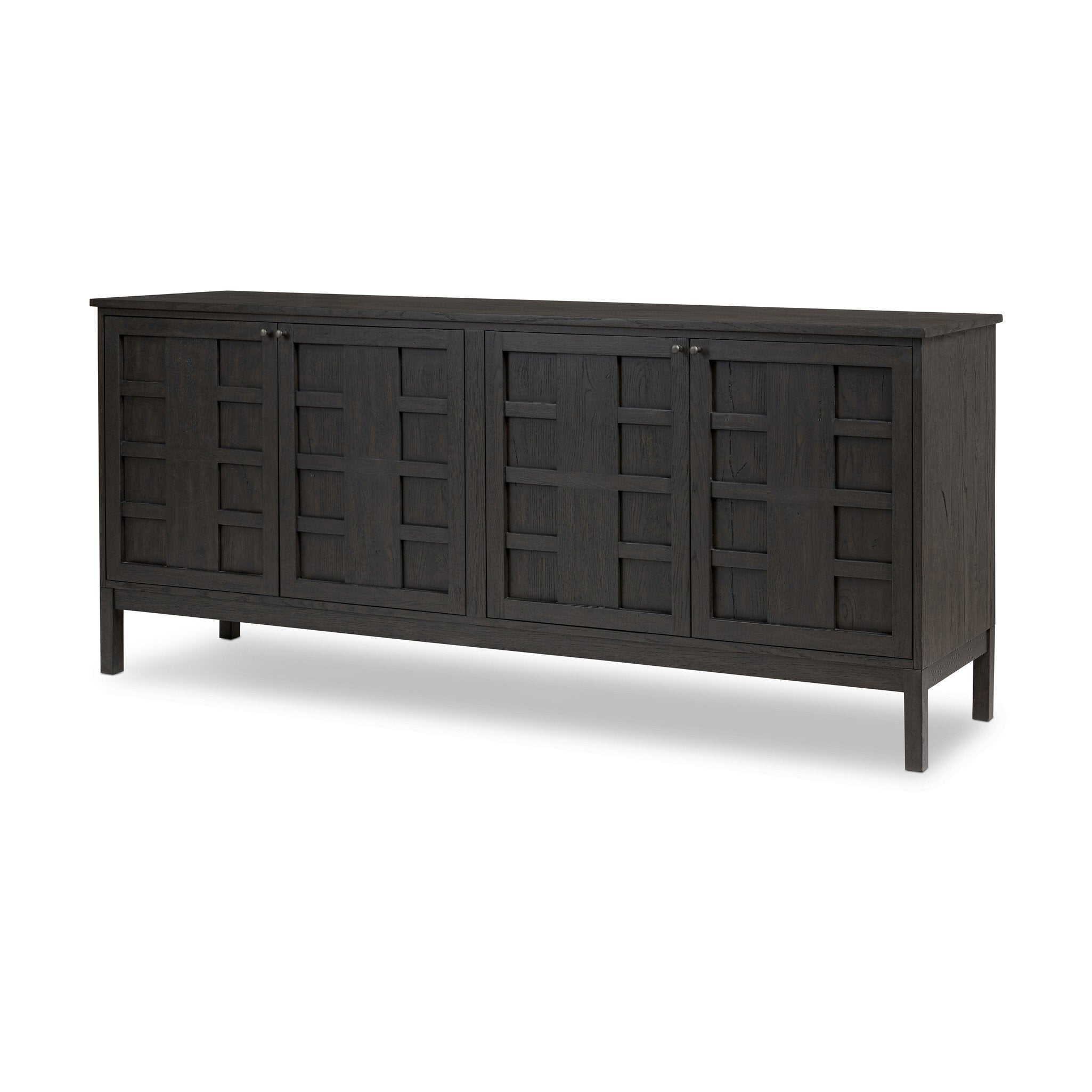 Featuring Alessio Smoked Black Sideboard by Four Hands at Amethyst Home. A smoked black finish plays up natural wood grain, while grid-like patterned doors bring dimension to clean lines. Interior shelving awaits storage of serveware, table linens and more.Overall Dimensions: 82.00"w x 20.00"d x 34.75"hWeight : 203.93 lbsMaterials : Solid Oak, Thick Oak Veneer. Amethyst Home provides interior design, new construction, custom furniture, and area rugs in the Houston metro area