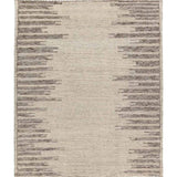 Featuring Alpine Patra Hand-Knotted Rug by Jaipur Living at Amethyst Home. Inspired by textiles from the Tullu region in Morocco, the Patra area rug showcases a linear design in neutral shades of cream, taupe, brown, and gray. This high-piled accent lends warmth and comfort to any space with durable wool hand-knotted onto a cotton foundation. Braided fring. Amethyst Home provides interior design, new home construction design consulting, vintage area rugs, and lighting in the Washington metro area.