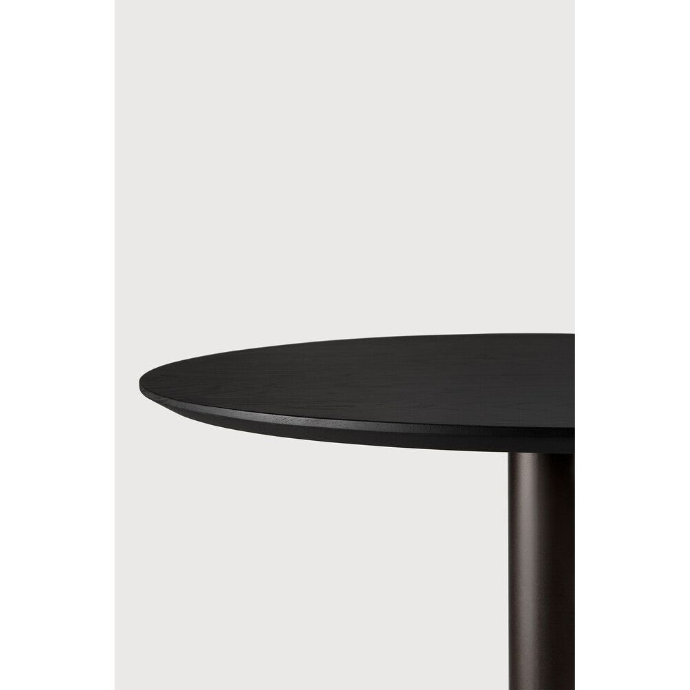 Featuring Blend Dark Bronze Metal Oak Black Dining Table by Ethnicraft at Amethyst Home. The Blend dining table is a dynamic solution that evolves to the needs of modern spaces. Its design features interchangeable table tops, offering flexibility to match any aesthetic, particularly in commercial settings. Compact and versatile, the Blend balances practicality and style for sp. Amethyst Home provides interior design, new construction, custom furniture, and area rugs in the Winter Garden metro area