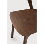 Featuring Bok No Upholstery Varnished Teak Brown Dining Chair by Ethnicraft at Amethyst Home. Reminiscent of a goat's curved horns, the Bok collection combines sculptural elegance and contemporary crafting into a graceful and airy form. Over the years, the Bok dining chair has become one of Ethnicraft's most recognisable designs.Weight : 33 lb Dimensions: 24.5 in W x 23 in L x 35 in . Amethyst Home provides interior design, new construction, custom furniture, and area rugs in the Dallas metro area