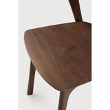 Featuring Bok No Upholstery Varnished Teak Brown Dining Chair by Ethnicraft at Amethyst Home. Reminiscent of a goat's curved horns, the Bok collection combines sculptural elegance and contemporary crafting into a graceful and airy form. Over the years, the Bok dining chair has become one of Ethnicraft's most recognisable designs.Weight : 33 lb Dimensions: 24.5 in W x 23 in L x 35 in . Amethyst Home provides interior design, new construction, custom furniture, and area rugs in the Dallas metro area