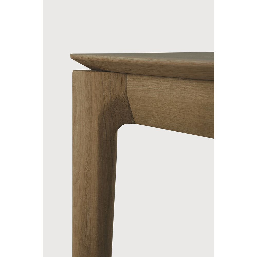 Featuring Bok Teak Bench by Ethnicraft at Amethyst Home. Reminiscent of a goat's curved horns, the Bok collection combines sculptural elegance and contemporary crafting into a graceful and airy form. The Bok bench will pair perfectly with the Bok dining table. But also, as a stand-alone against a wall, in a hallway, or at the end of a bed.Adjustable Feet : NoBrushed : NoCollection . Amethyst Home provides interior design, new construction, custom furniture, and area rugs in the Monterey metro area