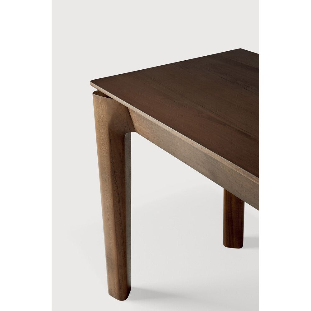 Featuring Bok Teak Brown Bench by Ethnicraft at Amethyst Home. Reminiscent of a goat's curved horns, the Bok collection combines sculptural elegance and contemporary crafting into a graceful and airy form. The Bok bench pairs well with the Bok dining table, but also as a stand-alone against a wall, in a hallway or at the end of a bed.
Overall Dimensions: 14 in W x 50 in L x 18.5 . Amethyst Home provides interior design, new construction, custom furniture, and area rugs in the Alpharetta metro area