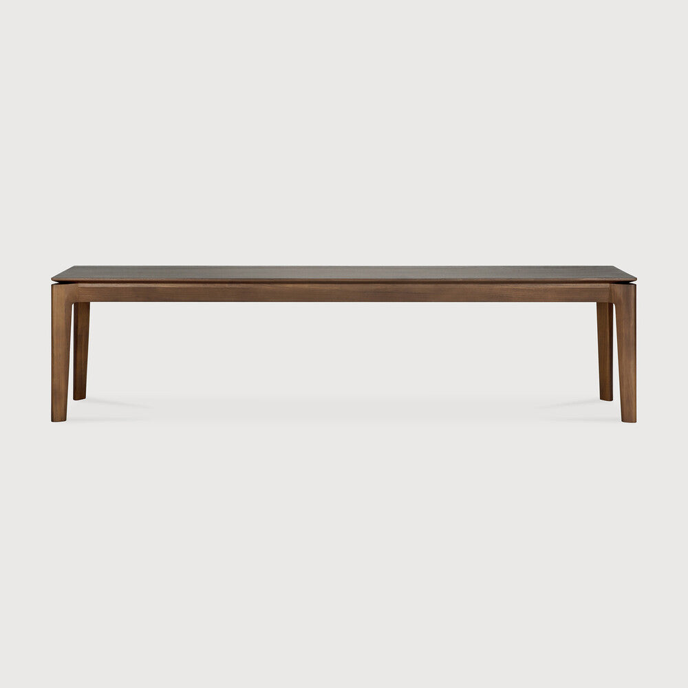 Featuring Bok Teak Brown Bench by Ethnicraft at Amethyst Home. Reminiscent of a goat's curved horns, the Bok collection combines sculptural elegance and contemporary crafting into a graceful and airy form. The Bok bench pairs well with the Bok dining table, but also as a stand-alone against a wall, in a hallway or at the end of a bed.
Overall Dimensions: 14 in W x 50 in L x 18.5. Amethyst Home provides interior design, new construction, custom furniture, and area rugs in the Los Angeles metro area