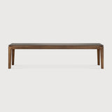 Featuring Bok Teak Brown Bench by Ethnicraft at Amethyst Home. Reminiscent of a goat's curved horns, the Bok collection combines sculptural elegance and contemporary crafting into a graceful and airy form. The Bok bench pairs well with the Bok dining table, but also as a stand-alone against a wall, in a hallway or at the end of a bed.
Overall Dimensions: 14 in W x 50 in L x 18.5. Amethyst Home provides interior design, new construction, custom furniture, and area rugs in the Los Angeles metro area