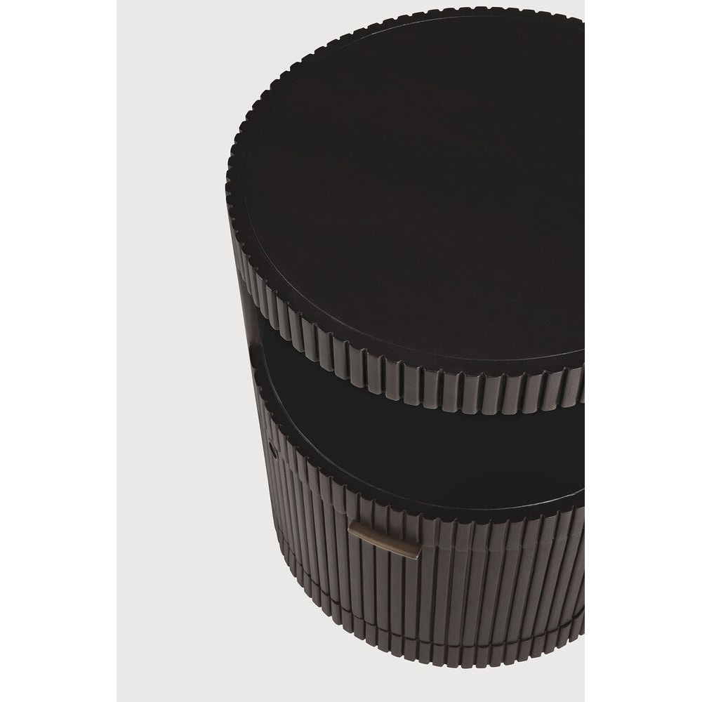 Featuring Boomerang Mahogany Dark Brown Drawer Unit by Ethnicraft at Amethyst Home. Inspired by shapes found in nature, the Boomerang collection features a playful, pebble top set on curved legs with a stacked, wood stick effect. Featuring hand-carved details and the practicality of wheels, the Boomerang drawer unit can serve many purposes, fitting perfectly under a desk for extra. Amethyst Home provides interior design, new construction, custom furniture, and area rugs in the Calabasas metro area