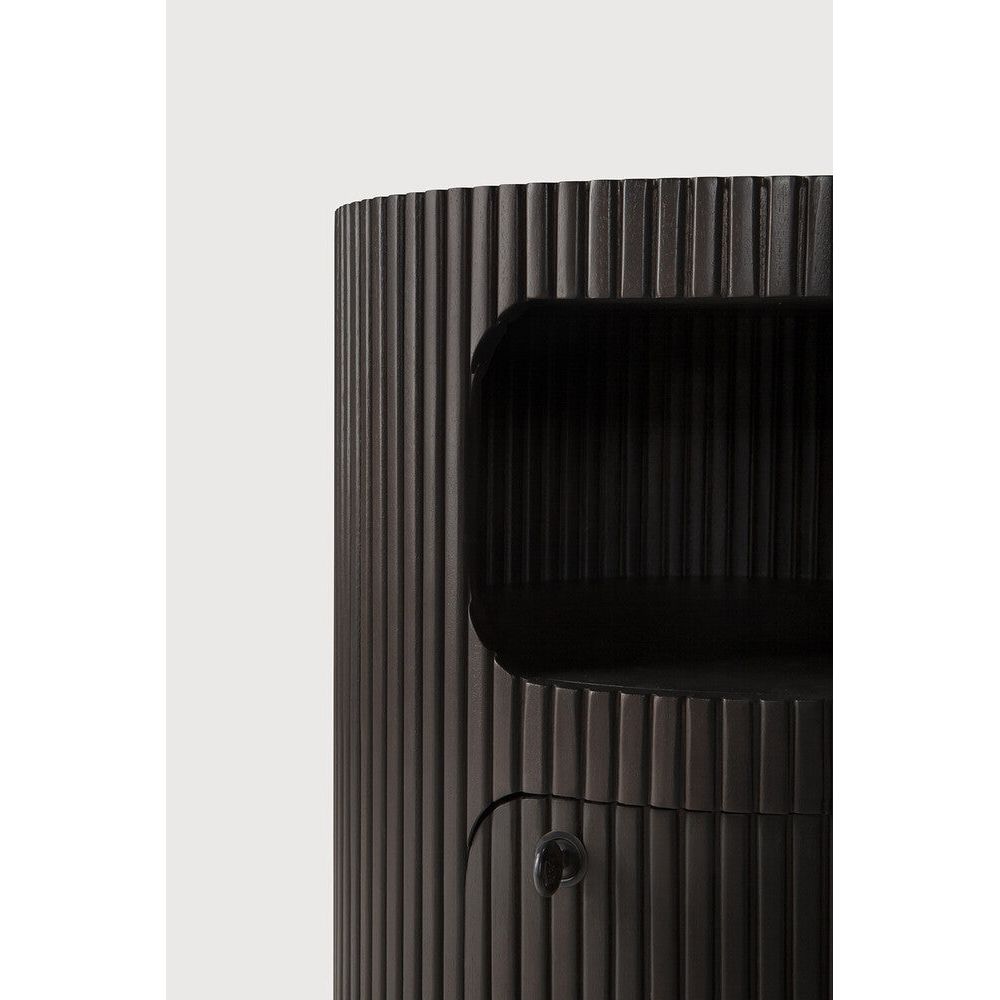 Featuring Boomerang Mahogany Dark Brown Drawer Unit by Ethnicraft at Amethyst Home. Inspired by shapes found in nature, the Boomerang collection features a playful, pebble top set on curved legs with a stacked, wood stick effect. Featuring hand-carved details and the practicality of wheels, the Boomerang drawer unit can serve many purposes, fitting perfectly under a desk for extra. Amethyst Home provides interior design, new construction, custom furniture, and area rugs in the Park City metro area