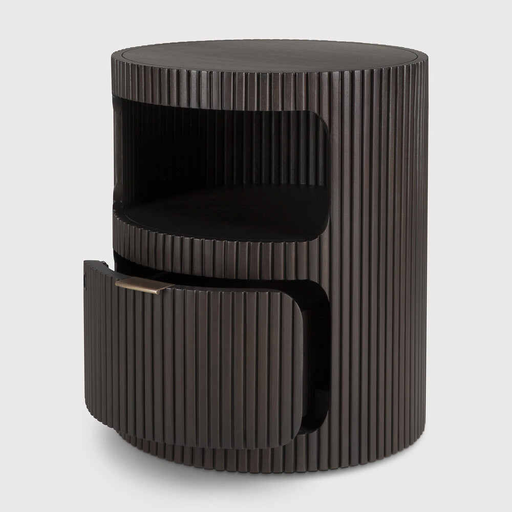 Featuring Boomerang Mahogany Dark Brown Drawer Unit by Ethnicraft at Amethyst Home. Inspired by shapes found in nature, the Boomerang collection features a playful, pebble top set on curved legs with a stacked, wood stick effect. Featuring hand-carved details and the practicality of wheels, the Boomerang drawer unit can serve many purposes, fitting perfectly under a desk for extra s. Amethyst Home provides interior design, new construction, custom furniture, and area rugs in the Seattle metro area