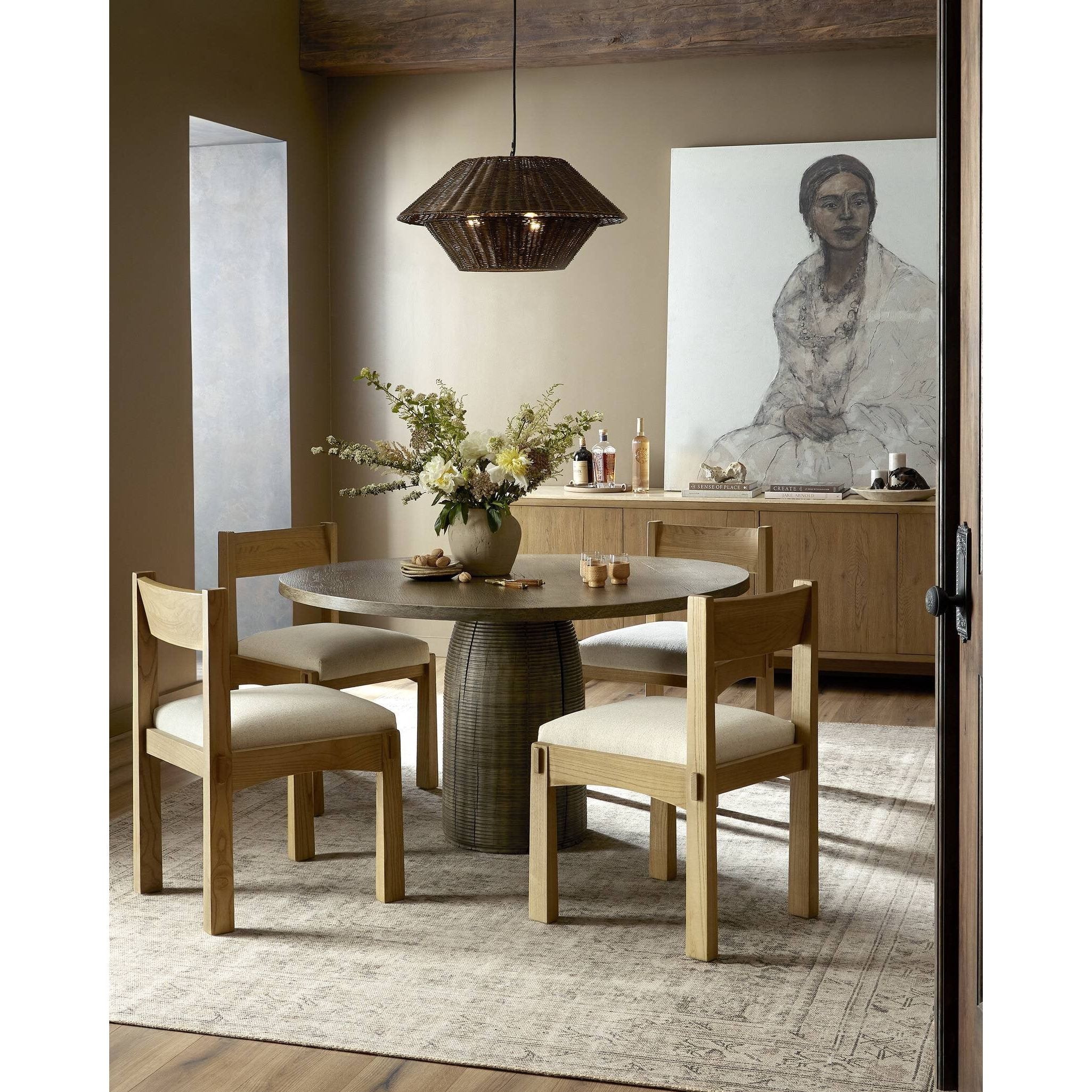 Featuring Crofton Antwerp Natural Dining Chair by Four Hands at Amethyst Home. Embracing a primitive design with wide, slightly tapered legs and a distinctive wood connection through the frame. Sandy nettlewood and natural fabric pair for rustic charm and modern comfort.Overall Dimensions: 20.75"w x 21.75"d x 33.00"hWeight : 21.38 lbsMaterials : 39% Linen, 35% Cotton, 26% Poly. Amethyst Home provides interior design, new construction, custom furniture, and area rugs in the Newport Beach metro area