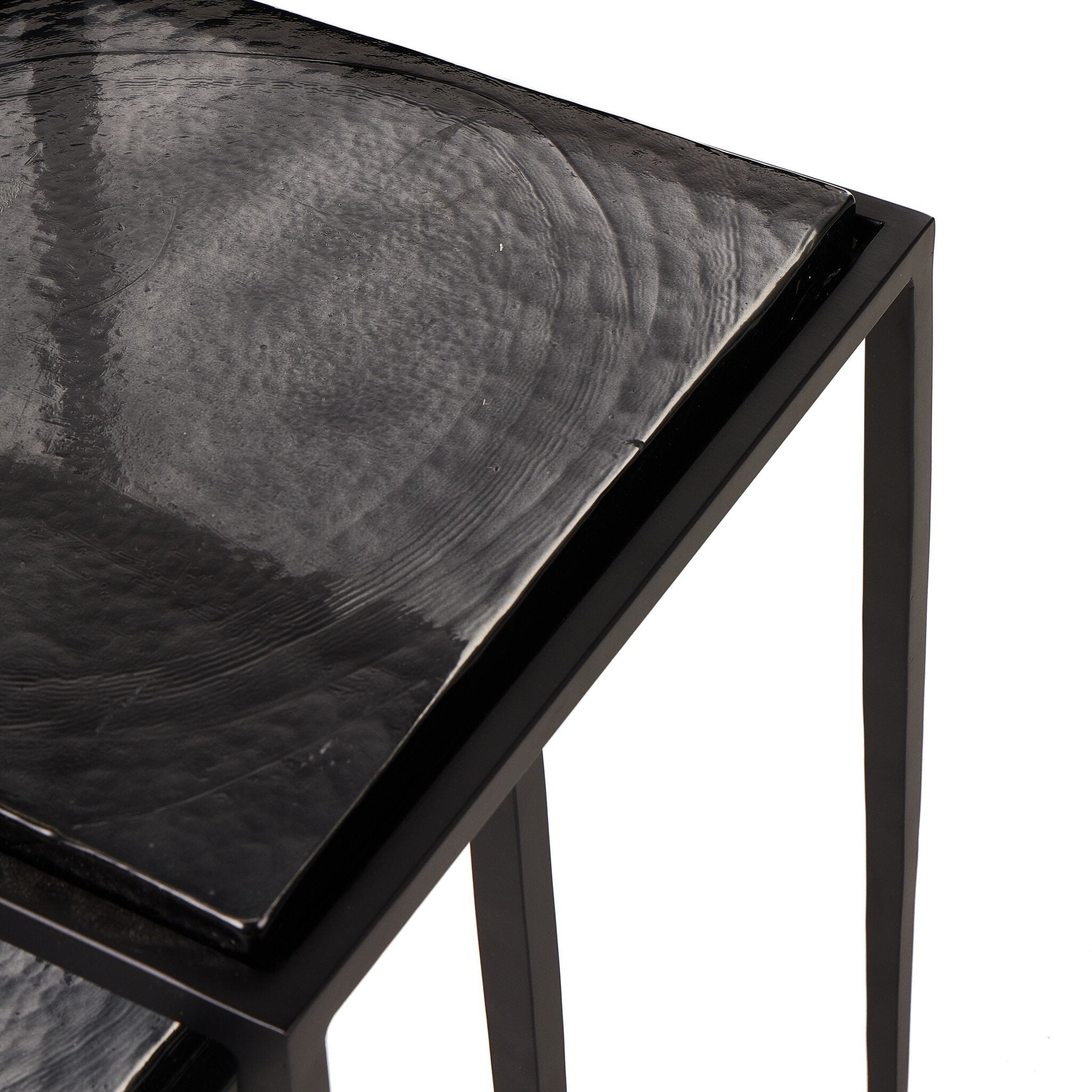 Featuring Dexter Smoked Black Cast Glass Nesting Tables by Four Hands at Amethyst Home. Embrace the mysterious with the Dexter smoked glass nesting tables.  Beautiful smoked glass gives a warm modern vibe while being practical.Overall Dimensions: 16.25"w x 16.25"d x 21.00"hWeight : 52.91 lbsMaterials : Cast Glass, Iron. Amethyst Home provides interior design, new construction, custom furniture, and area rugs in the Nashville metro area