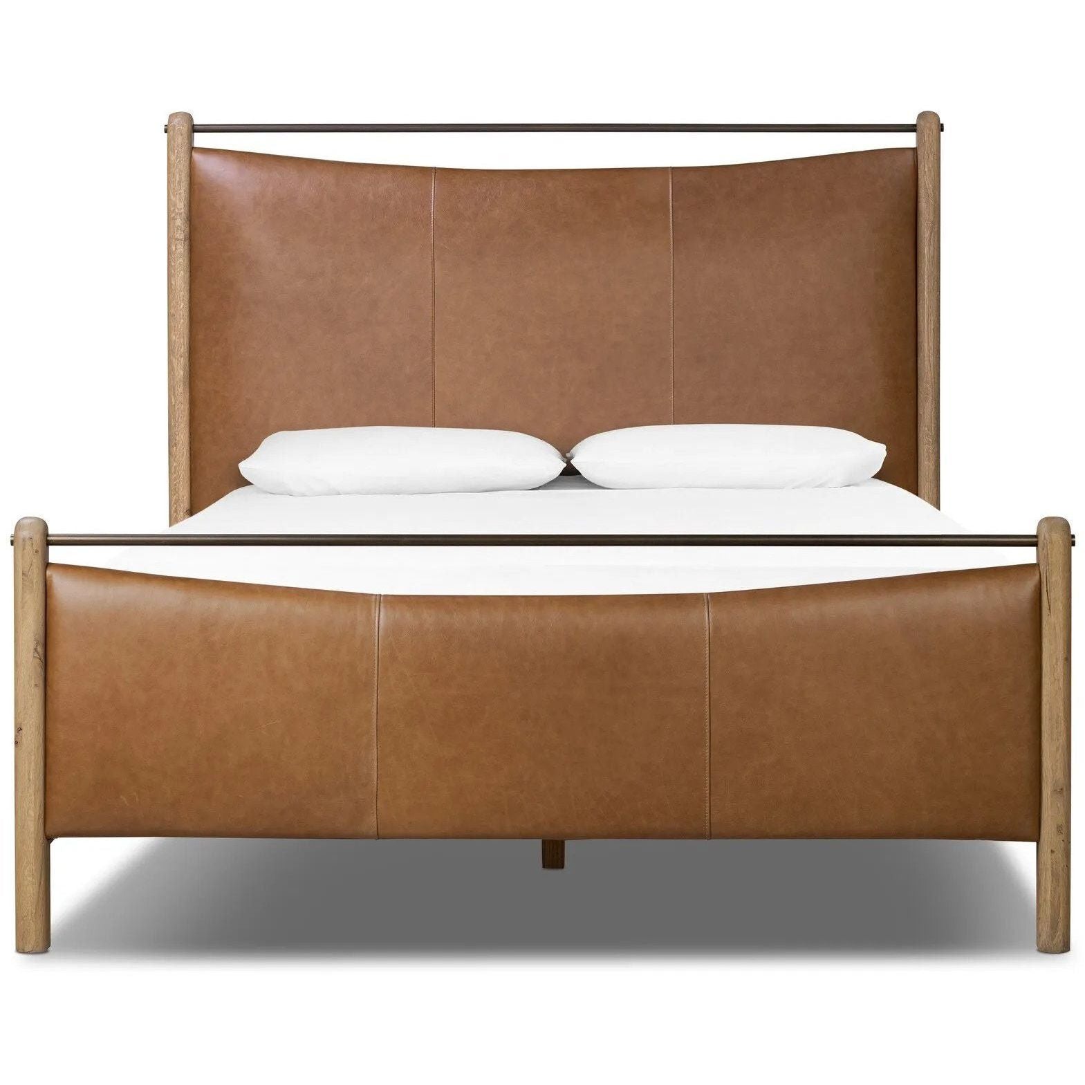 Slightly scooped top-grain leather tufting is bridged with metal bars in brushed brass for modern detailing. Aged smoked oak frames the three-paneled headboard and footboard wrapped in chestnut top-grain leather. Rounded legs soften the look Amethyst Home provides interior design, new home construction design consulting, vintage area rugs, and lighting in the Des Moines metro area.