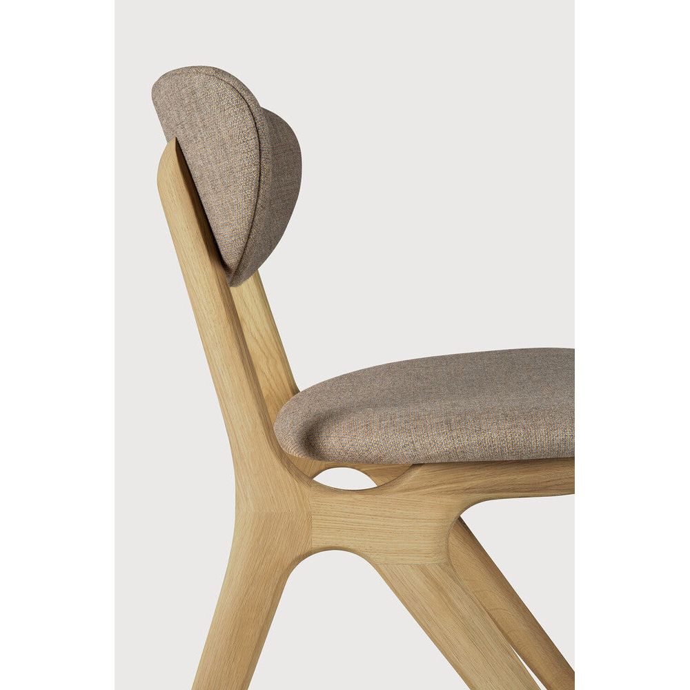 Featuring Eye Warm Grey Varnished Oak Dining Chair by Ethnicraft at Amethyst Home. Beauty is in the eye of the beholder. With sleek, angular, front legs and flowing smooth connections, the Eye dining chair is a hallmark solid wooden seating design. The curved backrest, reminiscent of a winked eye, inspired the name of the chair. Think subtle elegance with a stylish edge. Designed by. Amethyst Home provides interior design, new construction, custom furniture, and area rugs in the Houston metro area