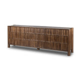 Featuring Ezri Cocoa Oak Sideboard by Four Hands at Amethyst Home. Grain and character variation within a solid oak finish give this sideboard organic visual interest. The carved design and floor-to-top cylinder legs give a primitive look that balances the movement of the wood pattern.Overall Dimensions: 98.00"w x 18.00"d x 34.00"hWeight : 245.38 lbsMaterials : Solid Oak. Amethyst Home provides interior design, new construction, custom furniture, and area rugs in the Nashville metro area