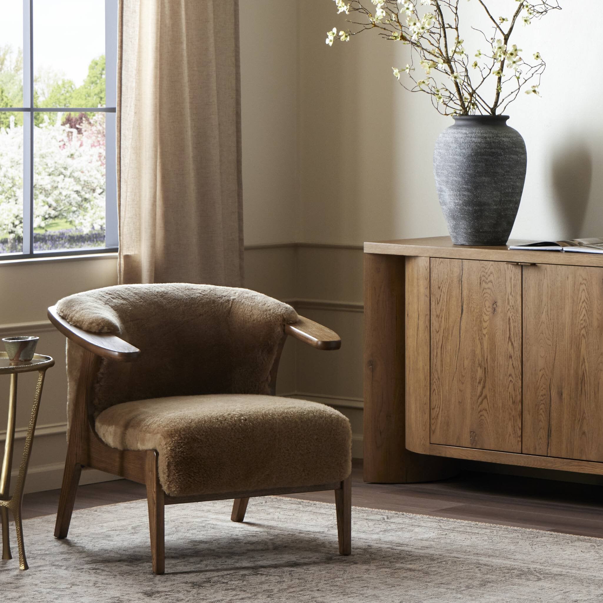 Featuring Fabian Desert Shearling Chair by Four Hands at Amethyst Home. Subtle paddle arms and a wrap frame of amber-finished ash embrace soft brown shearling, while S-spring construction ensures exceptional comfort.Overall Dimensions: 30.75"w x 33.00"d x 28.25"hWeight : 38.58 lbsMaterials : 100% Sheared Sheepskin, Solid Ash. Amethyst Home provides interior design, new construction, custom furniture, and area rugs in the Park City metro area