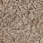 The perfect place to curl up with a good book. A hand-shaped parawood frame supports low, deep seating upholstered with taupe shearling Amethyst Home provides interior design, new home construction design consulting, vintage area rugs, and lighting in the Dallas metro area.