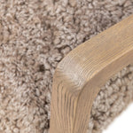 The perfect place to curl up with a good book. A hand-shaped parawood frame supports low, deep seating upholstered with taupe shearling Amethyst Home provides interior design, new home construction design consulting, vintage area rugs, and lighting in the Park City metro area.