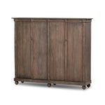 Taking after an antique from China, this inspired cabinet features overlapping double doors and rounded accents. Crafted from solid pine and veneers in a distressed finish for a rustic look Amethyst Home provides interior design, new home construction design consulting, vintage area rugs, and lighting in the Houston metro area.