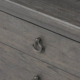 Baroque-period detailing gives this oak desk its  classic look. Made from worn black oak with metal ring pulls on its four drawers, as well as cabriole-like legs to soften the lines Amethyst Home provides interior design, new home construction design consulting, vintage area rugs, and lighting in the Calabasas metro area.
