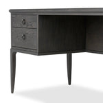 Baroque-period detailing gives this oak desk its  classic look. Made from worn black oak with metal ring pulls on its four drawers, as well as cabriole-like legs to soften the lines Amethyst Home provides interior design, new home construction design consulting, vintage area rugs, and lighting in the Los Angeles metro area.
