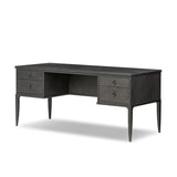 Baroque-period detailing gives this oak desk its  classic look. Made from worn black oak with metal ring pulls on its four drawers, as well as cabriole-like legs to soften the lines Amethyst Home provides interior design, new home construction design consulting, vintage area rugs, and lighting in the Nashville metro area.