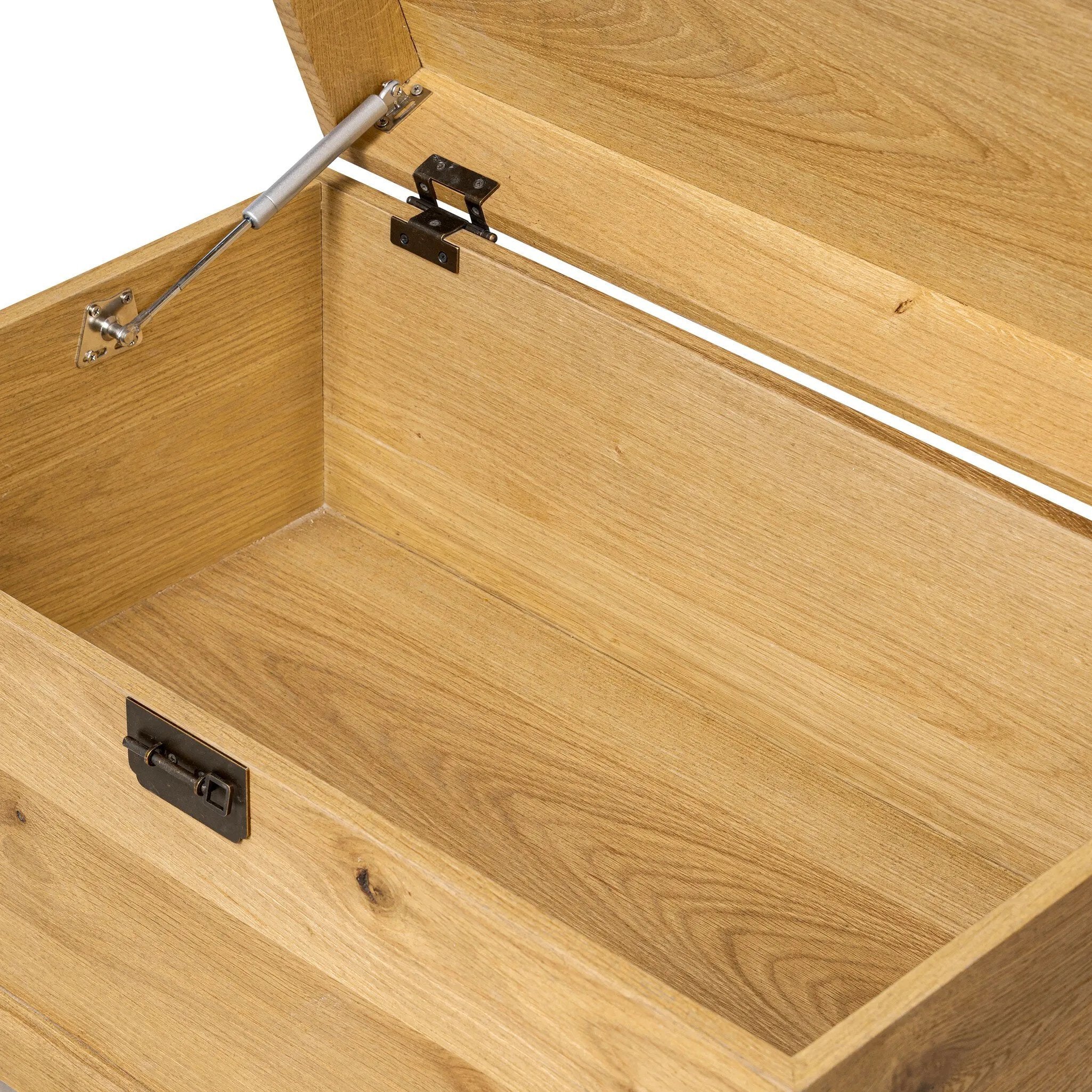 Inspired by classic Chinese antiques, this heritage-style trunk blends timeless design with modern functionality. Crafted from oak with a light, toasted finish, bronzed latch-and-key hardware adds a playful design detail Amethyst Home provides interior design, new home construction design consulting, vintage area rugs, and lighting in the Kansas City metro area.