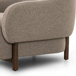 Featuring Audrey Weslie Feather Chair by Four Hands at Amethyst Home. This elevated arm chair features a clean top piece that partially overlaps its bottom counterpart and seamlessly blends the back cushion into the armrests in one fluid form. The seat's legs appear to extend from the seat and back, adding architectural interest. Upholstered in a recycl. Amethyst Home provides interior design, new home construction design consulting, vintage area rugs, and lighting in the Newport Beach metro area.