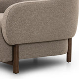 Featuring Audrey Weslie Feather Chair by Four Hands at Amethyst Home. This elevated arm chair features a clean top piece that partially overlaps its bottom counterpart and seamlessly blends the back cushion into the armrests in one fluid form. The seat's legs appear to extend from the seat and back, adding architectural interest. Upholstered in a recycl. Amethyst Home provides interior design, new home construction design consulting, vintage area rugs, and lighting in the Newport Beach metro area.