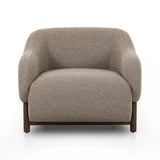 Featuring Audrey Weslie Feather Chair by Four Hands at Amethyst Home. This elevated arm chair features a clean top piece that partially overlaps its bottom counterpart and seamlessly blends the back cushion into the armrests in one fluid form. The seat's legs appear to extend from the seat and back, adding architectural interest. Upholstered in a recycled Tu. Amethyst Home provides interior design, new home construction design consulting, vintage area rugs, and lighting in the Portland metro area.