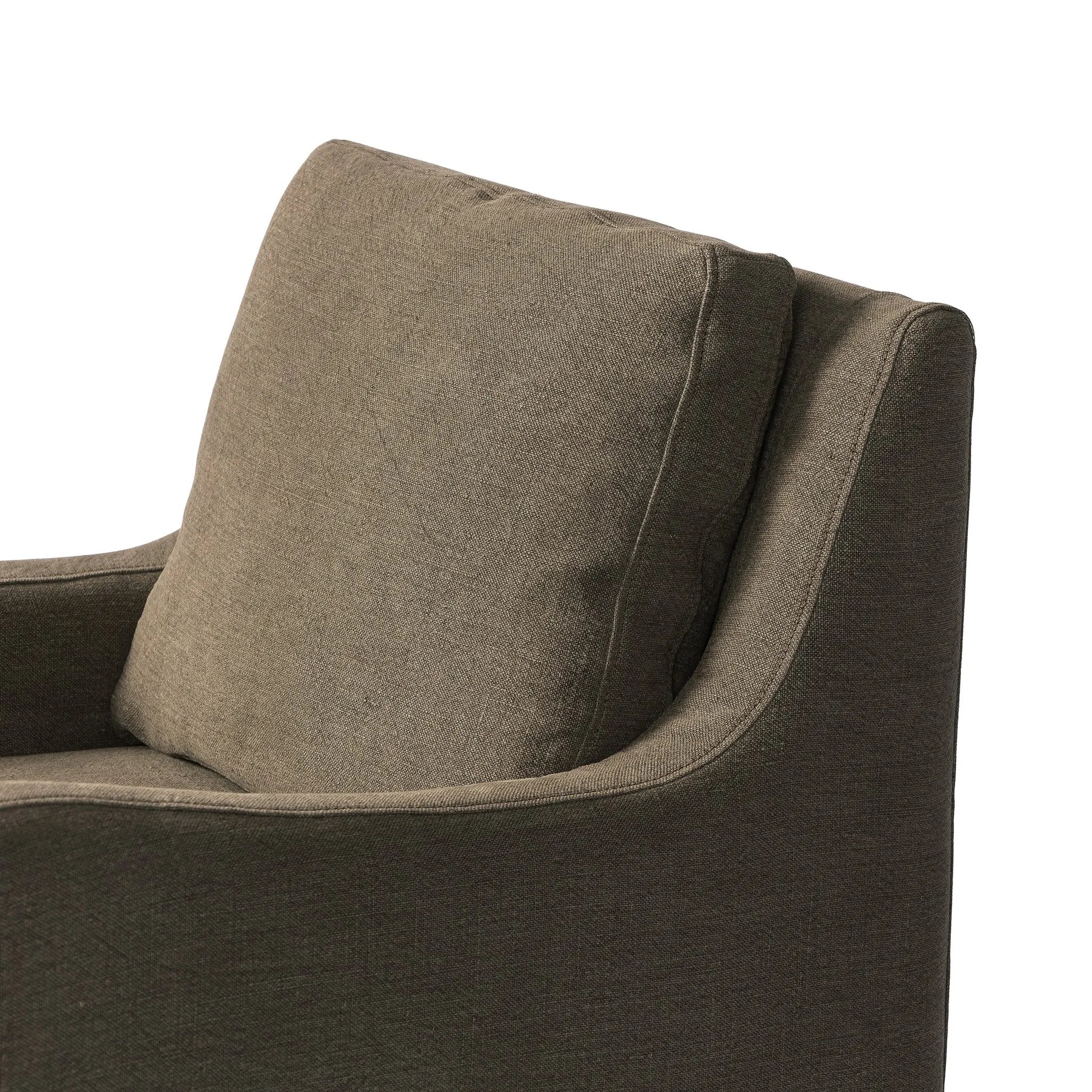 Heritage-inspired comfort. Sloping track arms are a study in playful forms, while the frame's fluid shape creates a simple, polished look. Tapered legs extend beyond a short skirt for a more relaxed style. Covered in 100% linen. A design collaboration by Amber Lewis and Four Hands. Amethyst Home provides interior design, new home construction design consulting, vintage area rugs, and lighting in the Houston metro area.