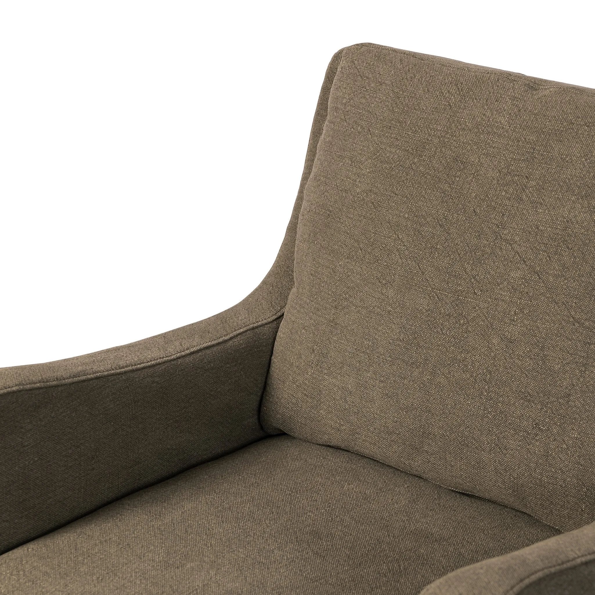 Heritage-inspired comfort. Sloping track arms are a study in playful forms, while the frame's fluid shape creates a simple, polished look. Tapered legs extend beyond a short skirt for a more relaxed style. Covered in 100% linen. A design collaboration by Amber Lewis and Four Hands. Amethyst Home provides interior design, new home construction design consulting, vintage area rugs, and lighting in the Los Angeles metro area.