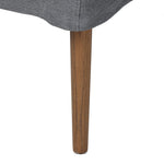 Heritage-inspired comfort. Sloping track arms are a study in playful forms, while the frame's fluid shape creates a simple, polished look. Tapered legs extend beyond a short skirt for a more relaxed style. Covered in 100% linen. A design collaboration by Amber Lewis and Four Hands. Amethyst Home provides interior design, new home construction design consulting, vintage area rugs, and lighting in the Los Angeles metro area.