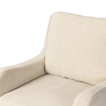 Heritage-inspired comfort. Sloping track arms are a study in playful forms, while the frame's fluid shape creates a simple, polished look. Tapered legs extend beyond a short skirt for a more relaxed style. Covered in 100% linen. A design collaboration by Amber Lewis and Four Hands. Amethyst Home provides interior design, new home construction design consulting, vintage area rugs, and lighting in the Miami metro area.