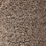 Intriguing while inviting, drum-style seating is upholstered in a soft, taupe shearling. A 360-degree swivel base of natural parawood places a fresh spin on a feminine form Amethyst Home provides interior design, new home construction design consulting, vintage area rugs, and lighting in the Austin metro area.