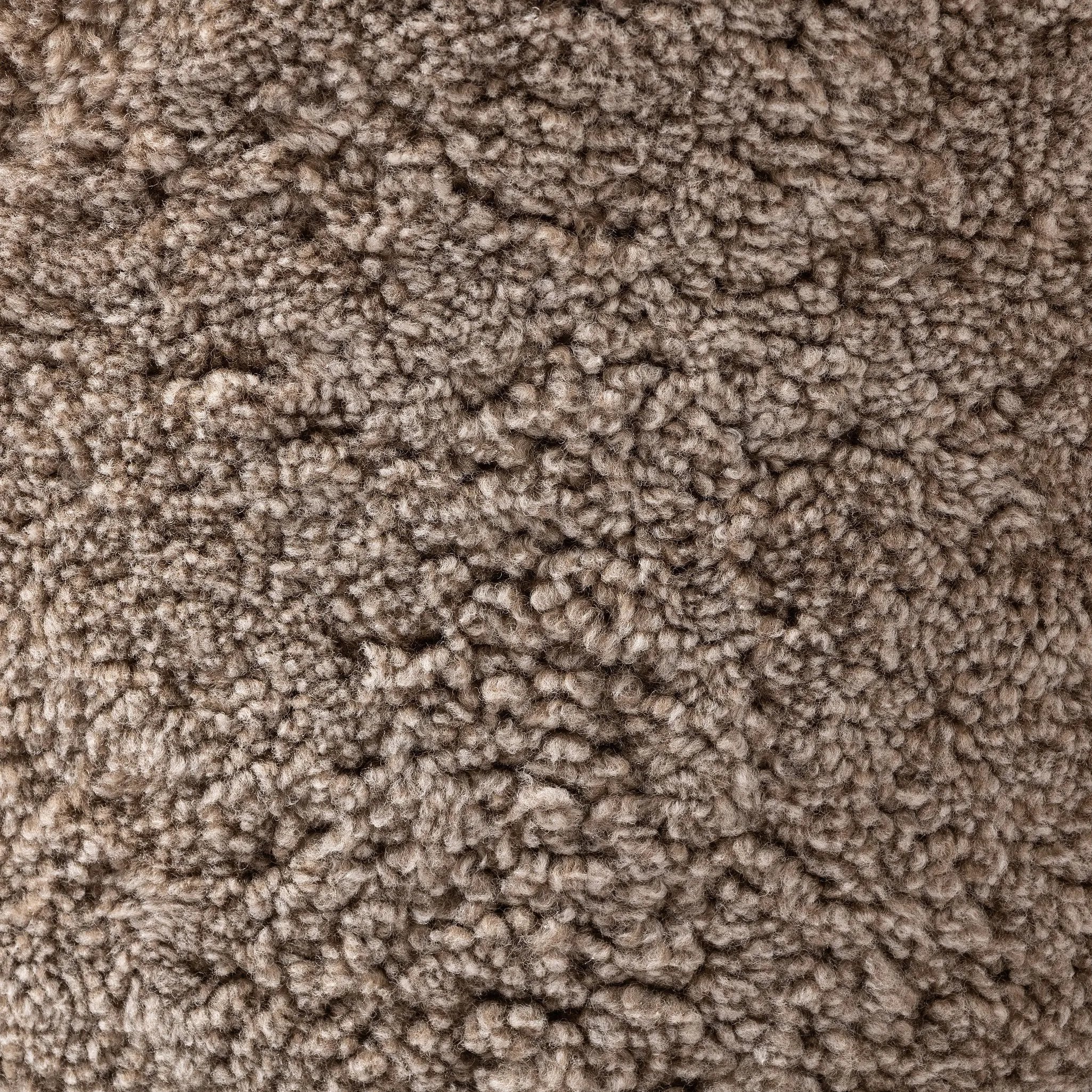 Intriguing while inviting, drum-style seating is upholstered in a soft, taupe shearling. A 360-degree swivel base of natural parawood places a fresh spin on a feminine form Amethyst Home provides interior design, new home construction design consulting, vintage area rugs, and lighting in the Austin metro area.