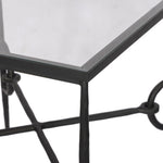 A slim frame of hammered gunmetal pairs with tempered glass, for a clean and timeless end table look. Stretchers attach to metal loops for an elevated design detail Amethyst Home provides interior design, new home construction design consulting, vintage area rugs, and lighting in the Newport Beach metro area.