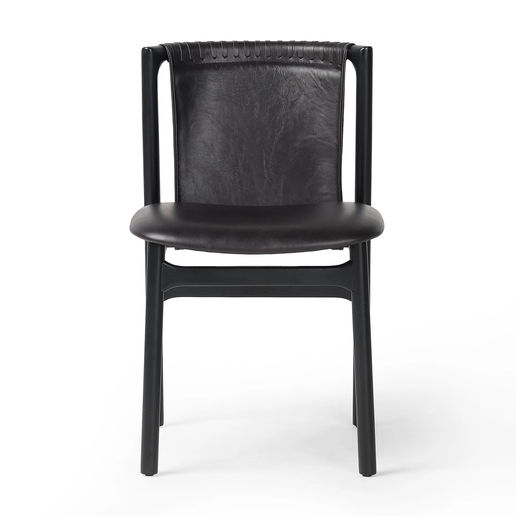 Featuring Baden Sonoma Black Dining Chair by Four Hands at Amethyst Home. Midcentury-inspired with its minimalist wooden frame, this armless dining chair features a low back and float-like seat upholstered in slightly distressed black top-grain leather exclusive to Four Hands. Leather wrap detailing for texture.Overall Dimensions: 19.75"w x 23.25"d x 32.25". Amethyst Home provides interior design, new home construction design consulting, vintage area rugs, and lighting in the Charlotte metro area.